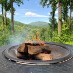 Lite fire pit with Old Rag mountain in the background