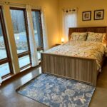 Your second bedroom has a queen size bed and a lot of natural light during the day.